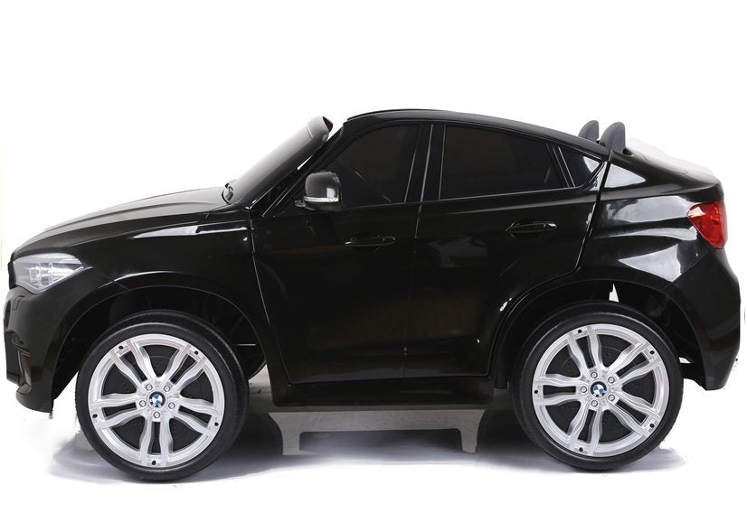 Licencirani auto na akumulator BMW X6M - dvosjed - crni/lakirani